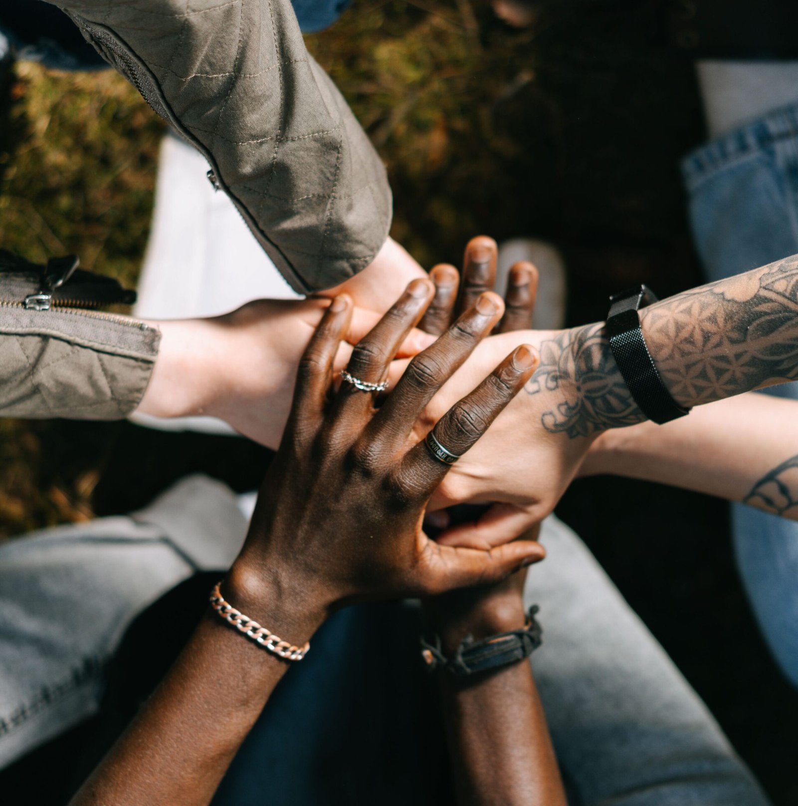 Home Multiple hands joining together